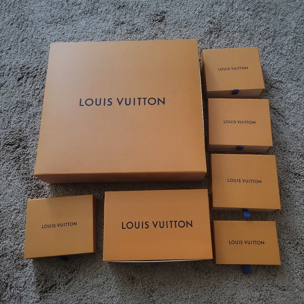 LV, Gucci, Coach, Tory Burch, Fendi and Saint Laurant boxes and bags